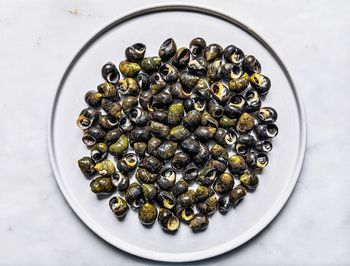 Directly above shot of roasted coffee beans on table