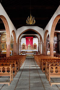 Empty benches in the church