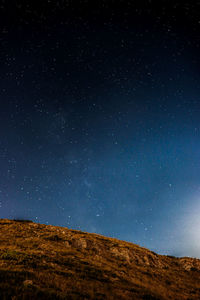 Low angle view of star field against sky at night