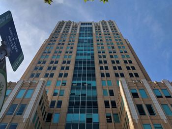 Low angle view of modern buildings against sky