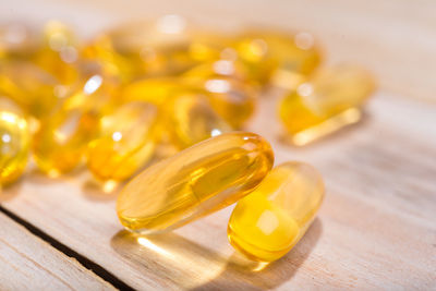 Close-up of yellow flower on table