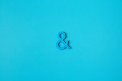Close-up of heart shape against blue background