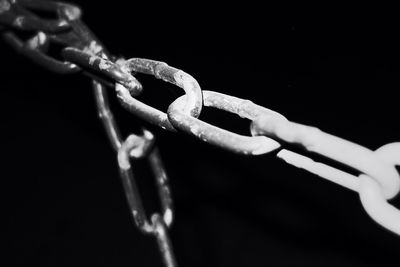 Close-up of spiral against black background