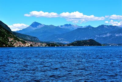 Scenic view of lake against blue sky