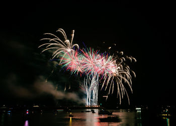 Firework display at night