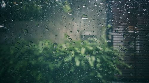 Full frame shot of wet glass window