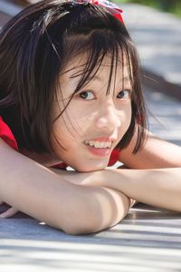 Close-up up portrait of smiling girl,young women looking to the camera.