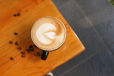 High angle view of cappuccino on table