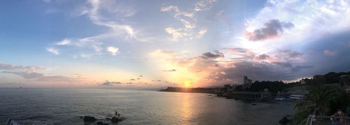 Panoramic view of sea against sky during sunset