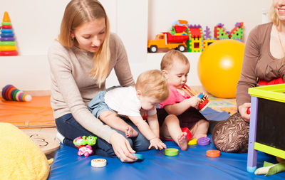 People playing with toy at home