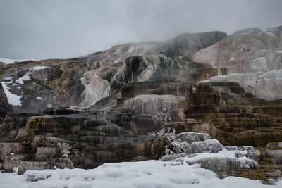 Hot springs of volcanic environment at yellowstone national park in winter