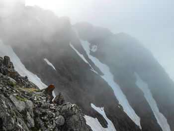 Scenic view of rocky mountains during winter