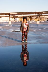 Portrait of woman standing on water