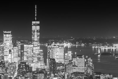 Illuminated buildings in city at night