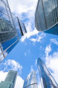 Skyscrapers modern architecture office building with clouds in blue sky, high tech style 