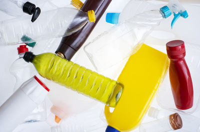 High angle view of bottles on table