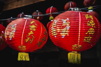 Close-up of illuminated lantern hanging at night