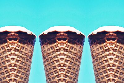 Low angle view of building against blue sky