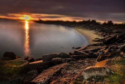 Scenic view of sea against cloudy sky