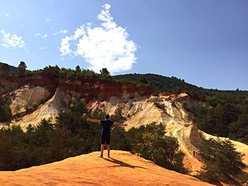 Tourists on rocky mountains