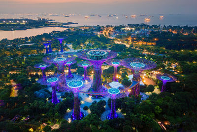 High angle view of illuminated cityscape at night