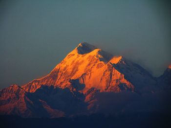 Scenic view of volcanic mountain against sky