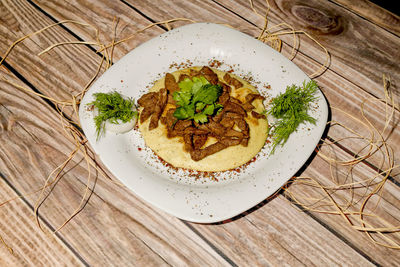 High angle view of food in plate on table