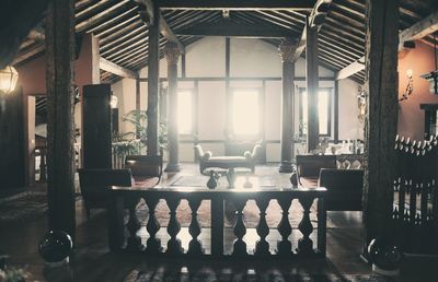 Empty chairs and tables in restaurant