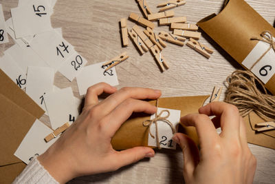 Cropped image of man working on table