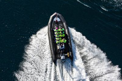 High angle view of boat sailing in water