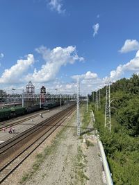 Train on railroad tracks against sky