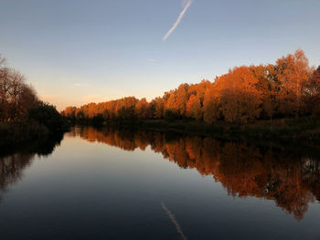 Scenic view of lake against sky during autumn