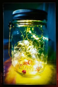 Close-up of glass jar on table