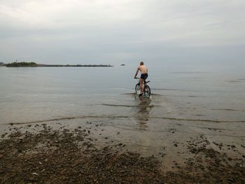 Woman standing on beach