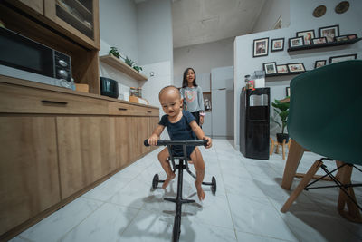 Side view of man riding bicycle