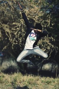 Man jumping in field