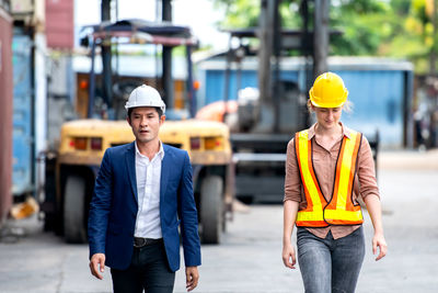 Young man working with umbrella
