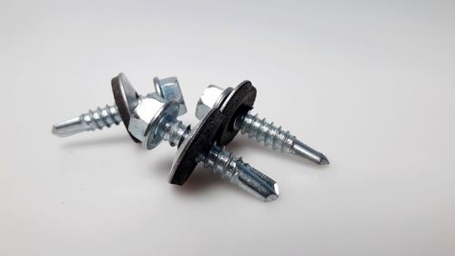 High angle view of chain against white background