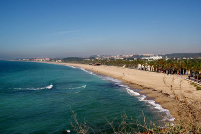 High angle view of beach against blue sky