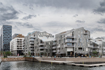 Buildings in city against sky