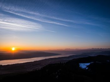 Scenic view of sunset over landscape