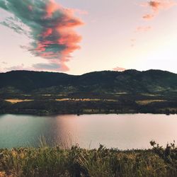 Scenic view of lake against sky during sunset