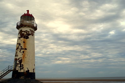Low angle view of lighthouse against sky