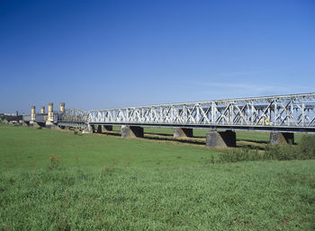 Bridge against clear blue sky