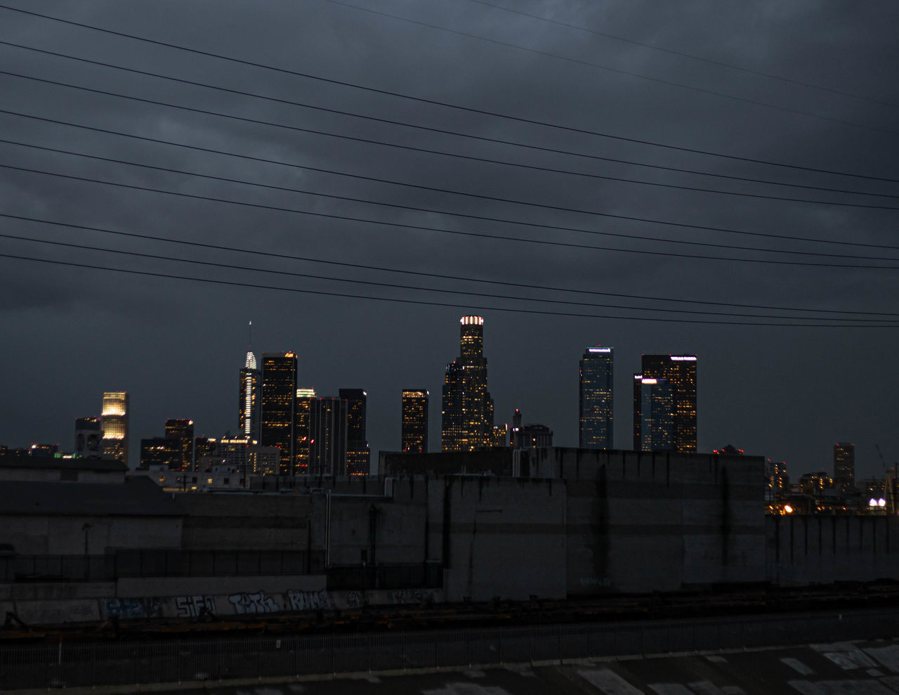 MODERN BUILDINGS IN CITY AT NIGHT