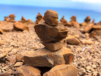 Close-up of stones stacked outdoors