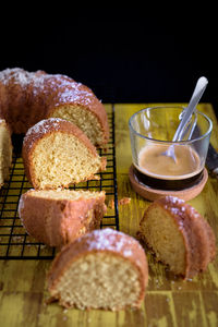 Close-up of coffee and almond bread slices