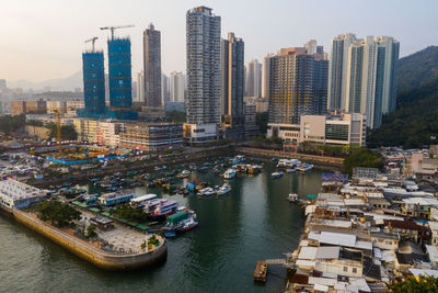 High angle view of river amidst buildings in city