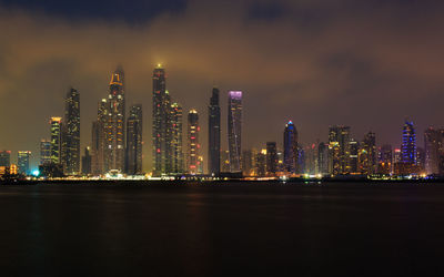 Illuminated skyscrapers of dubai by night