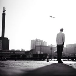 Silhouette of woman against clear sky